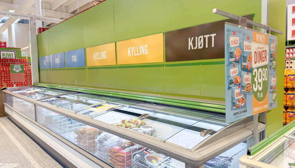 Helgrønt: En Kiwi-grønn vegg med tydelige kategoriskilt lyser opp i butikklandskapet.